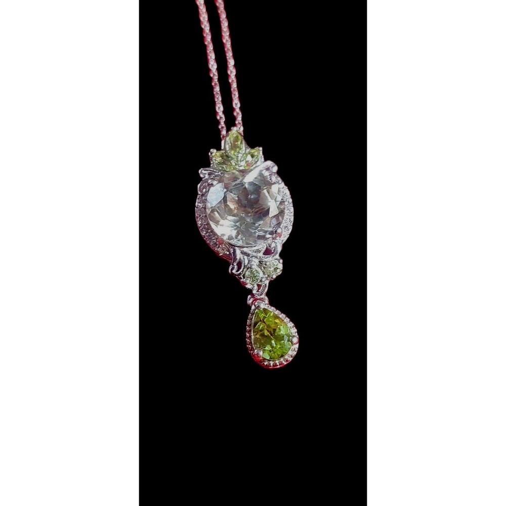 Genuine peridot Rutilated quartz sterling silver pendant STS
